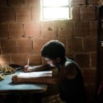 Brazilian girl studying at home